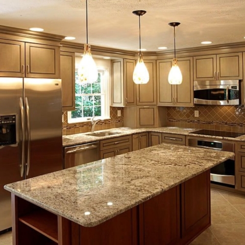 Kitchen with new wooden cabinets and granite counter tops